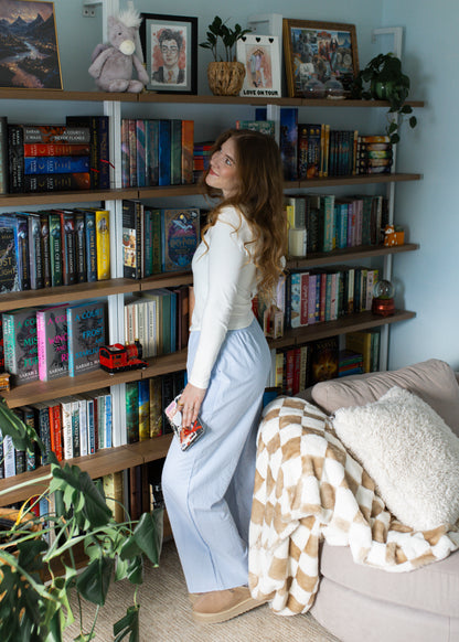 turning pages pants in light blue